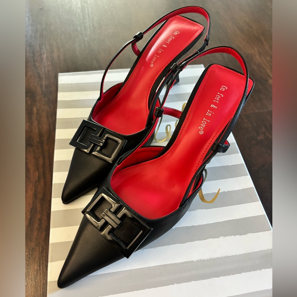 Black Pointed Slingback Heels with Red Insole and Decorative Buckle